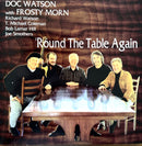 a group of men sitting around a wooden table