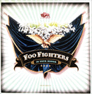 a picture of a banner with an eagle and flowers on it