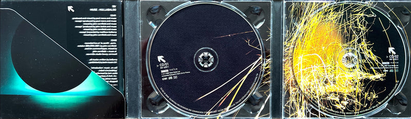 a close up of two cd's in a box