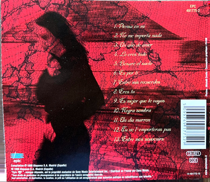 the back of a cd case with a picture of a man holding an umbrella