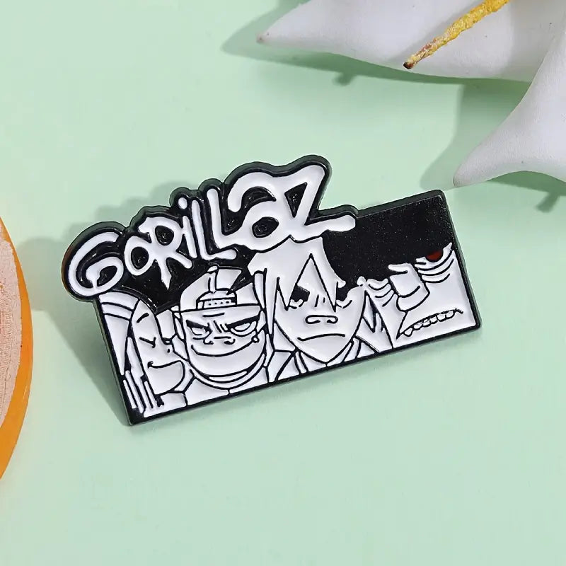 Pin's Métallique "Gorillaz" Noir et Blanc - Broche de Collection pour Fans de Musique