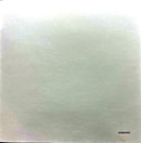 a black and white photo of a man on a surfboard