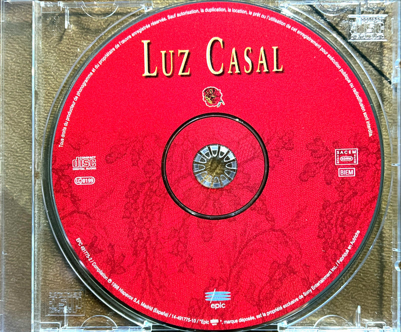 a cd case with a red label on it