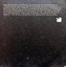 a black book with writing on it sitting on a table