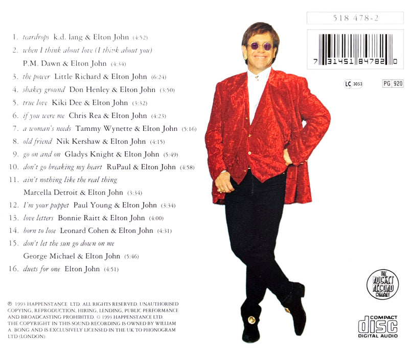 a man in a red jacket and black pants