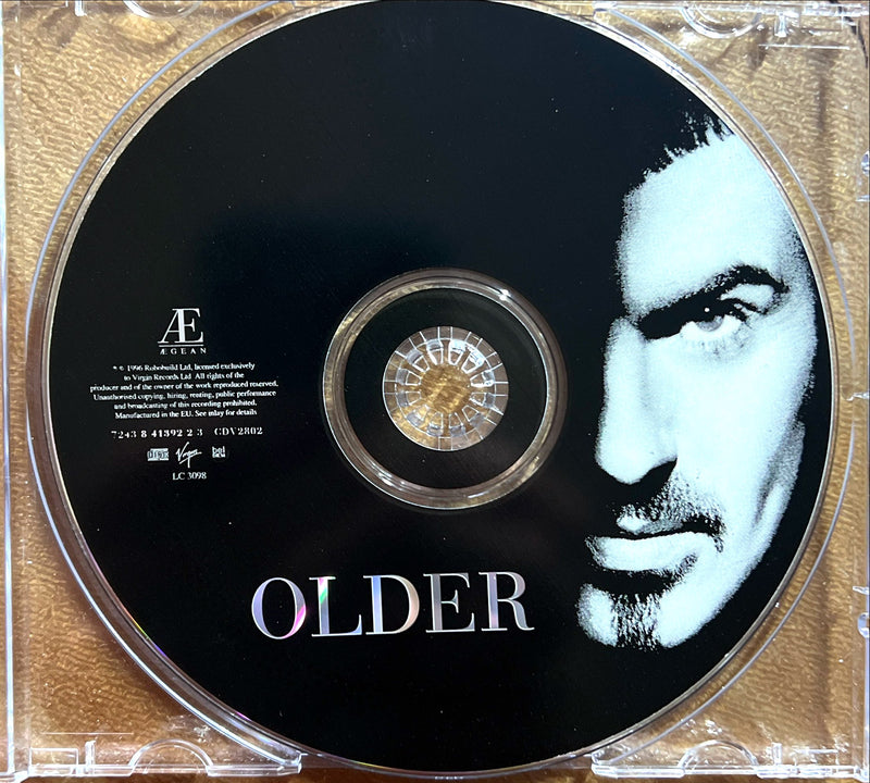 a cd with a picture of a man on it