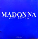 a blue book with the words madonna on it