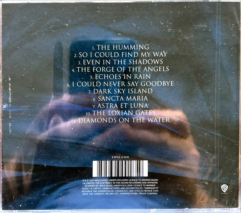 a blurry photo of a person's face with the words the humming