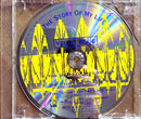 a cd in a clear case with a yellow and blue pattern