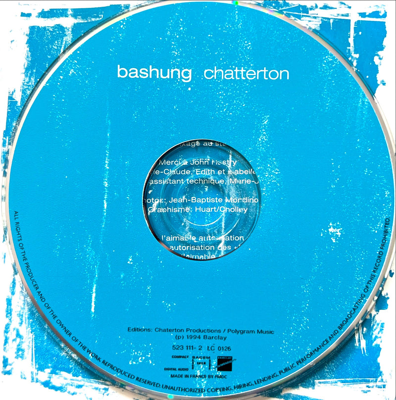 a cd disc with a blue cover on a white background