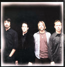 a group of men standing next to each other