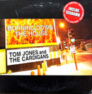 a sign that reads burning down the house