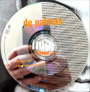 a person holding a cd in their hand