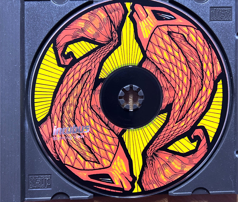 a cd case with a picture of two birds on it
