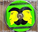 a cd with a picture of two men's faces on it
