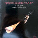 a book with a picture of a person holding a wooden instrument