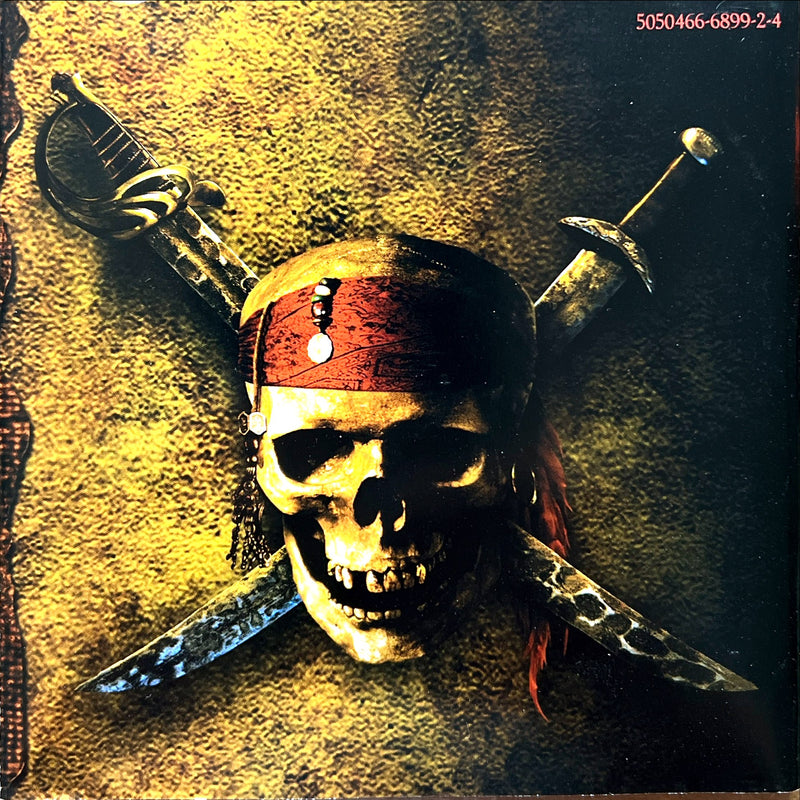 a skull with a pirate hat and two swords