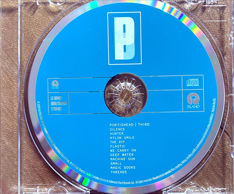 a cd case with a disc inside of it
