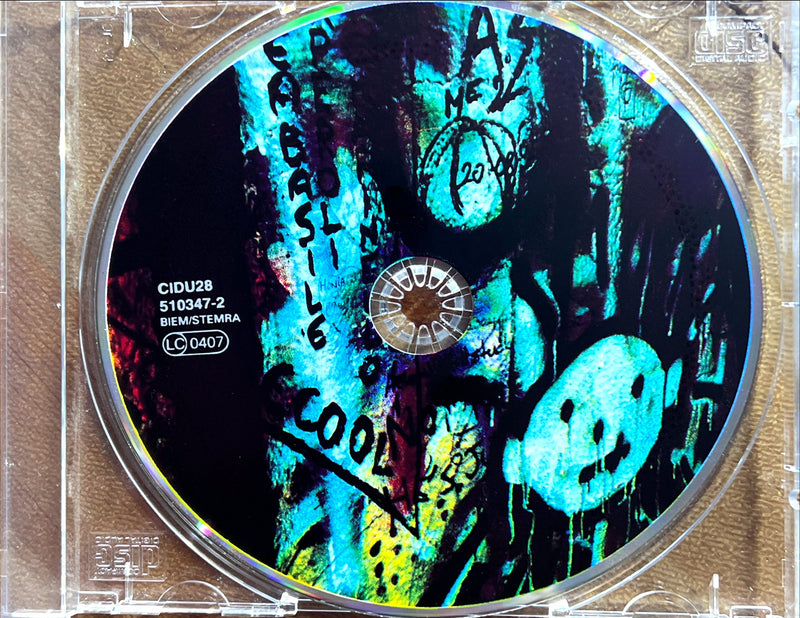 a cd case with a picture of graffiti on it