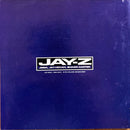 a blue book with a black and white sticker on it