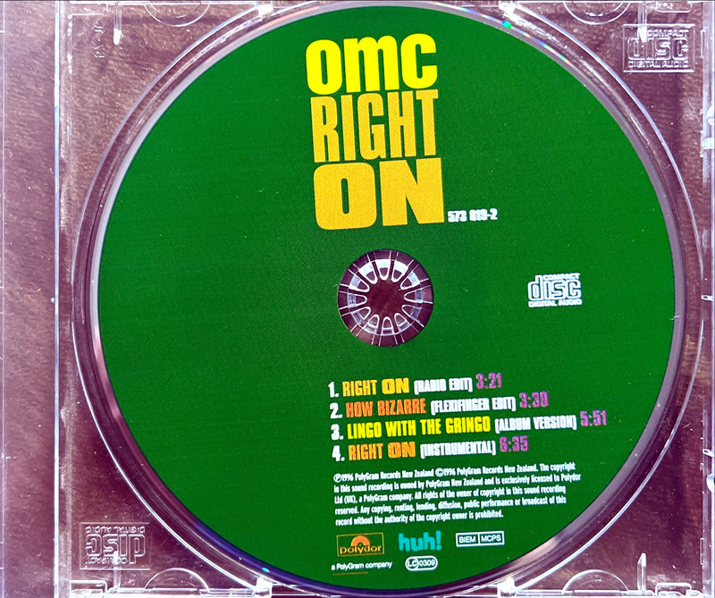 a cd with a green cover and yellow lettering on it