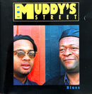 a couple of men standing next to each other