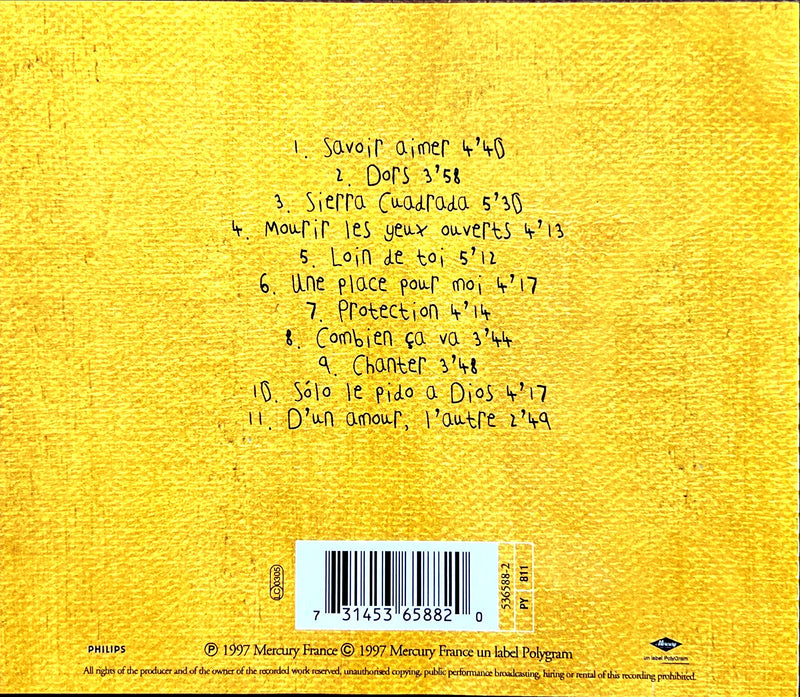 the back of a yellow book with writing on it