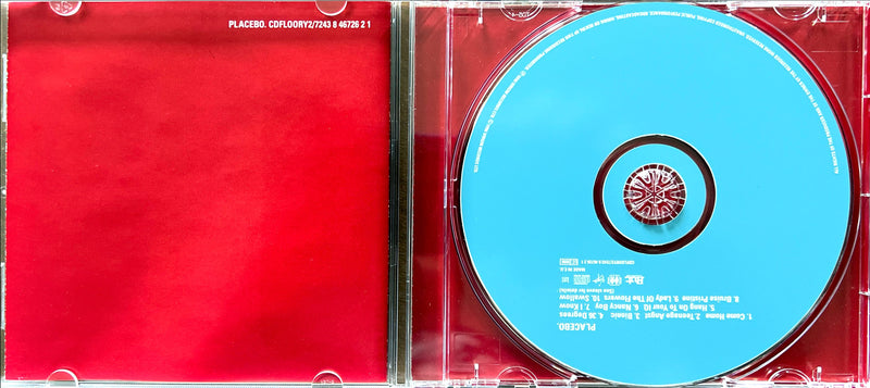 a cd case with a blue disc inside of it