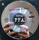 a person holding a cd in their hand