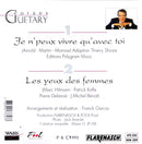 a cd cover with a picture of a man in a suit