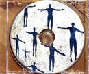 a cd with a picture of a group of people on it