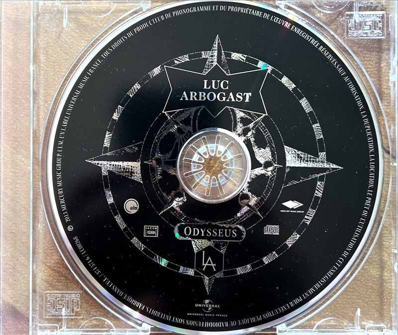 a cd case with a circular design on it