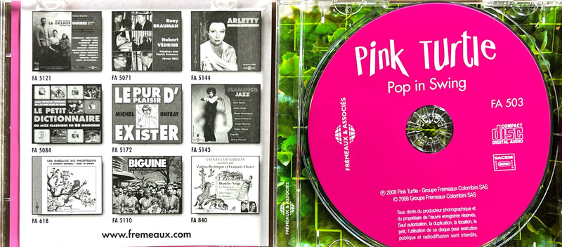 a cd case with a pink disc inside of it