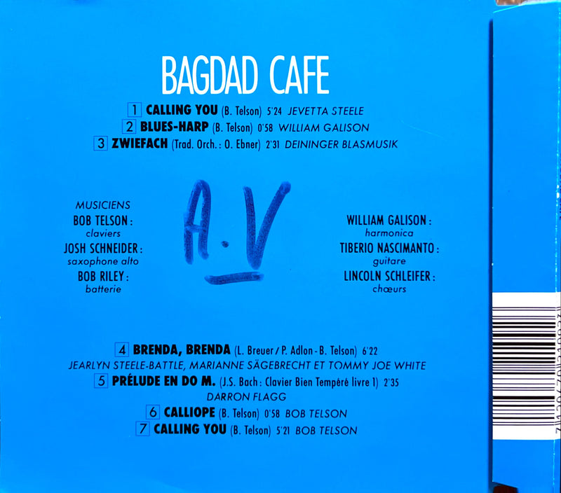 the back of a blue box with writing on it