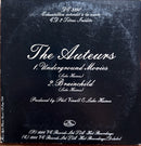 a black plaque with a white writing on it