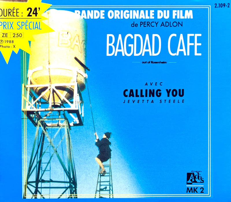 a movie poster with a man climbing a tower