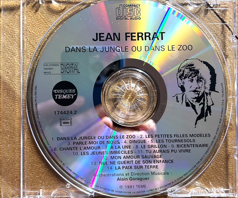 a cd with a picture of jean ferrat on it