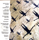 a magazine cover with shadows of people on it