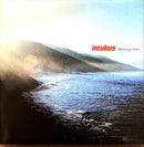 a picture of a body of water with mountains in the background